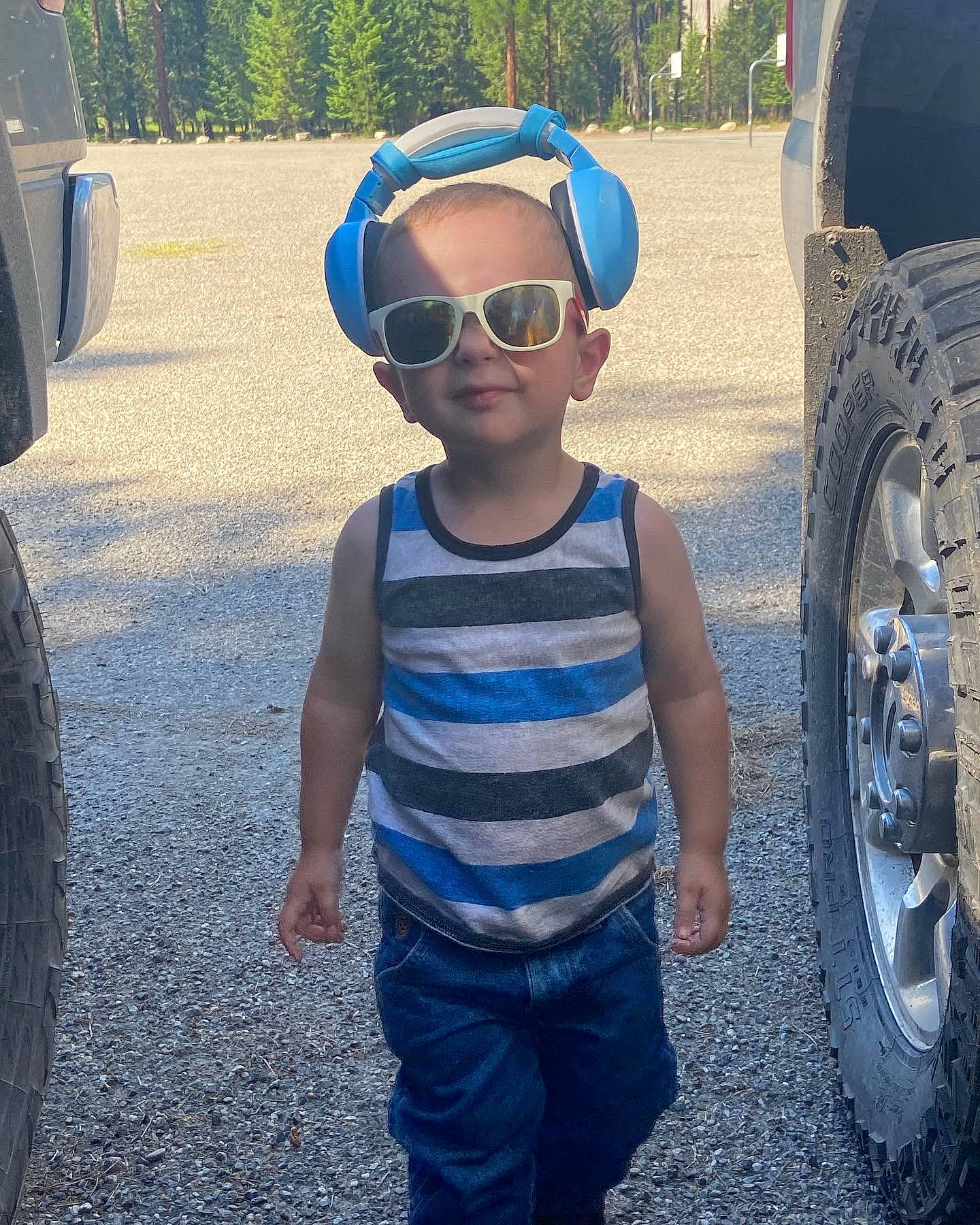 Branson joined the competition — help win amazing prizes! asphalt, automotive_lighting, automotive_tire, blue, bumper, car, cool, eyewear, glasses, goggles, light, motor_vehicle, person, sunglasses, synthetic_rubber, tire, tread, vehicle, vehicle_door, vision_care