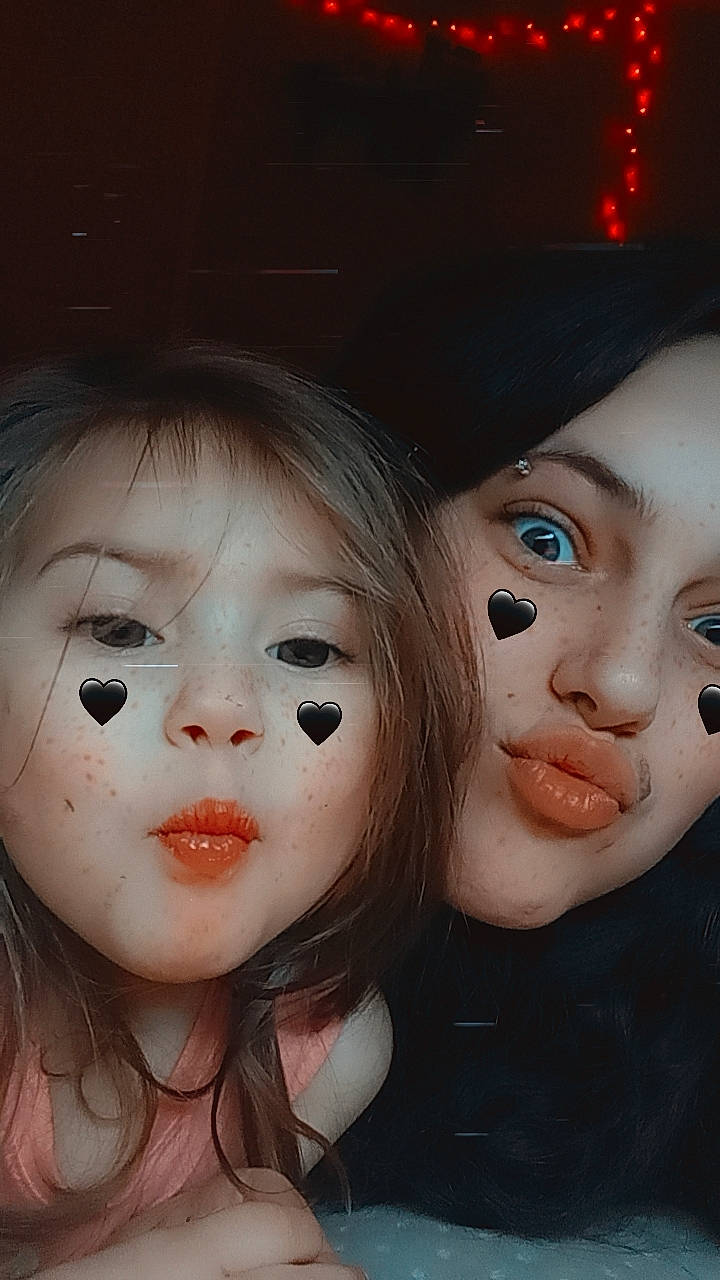 Georgia May is registered to the contest to win money with this photo: art, bangs, black_hair, brown_hair, cap, cheek, costume_hat, doll, eye, eyebrow, eyelash, flash_photography, fun, iris, layered_hair, lip, nose, person, step_cutting, toy