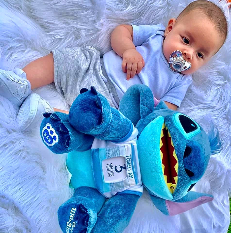 Gerardo is registered to the contest to win money with this photo: baby, blue, child, person, play, plush, product, room, stuffed_toy, textile, toddler, toy, turquoise