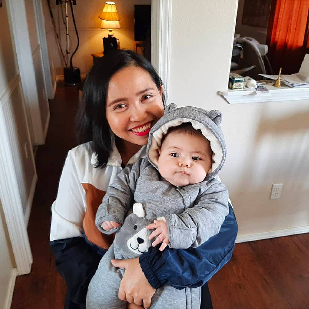 Ulysses joined the competition — help win amazing prizes! baby, baby_toddler_clothing, child, comfort, event, floor, flooring, fun, fur, gesture, happy, joy, lamp, light_fixture, person, room, sitting, skin, smile, toddler