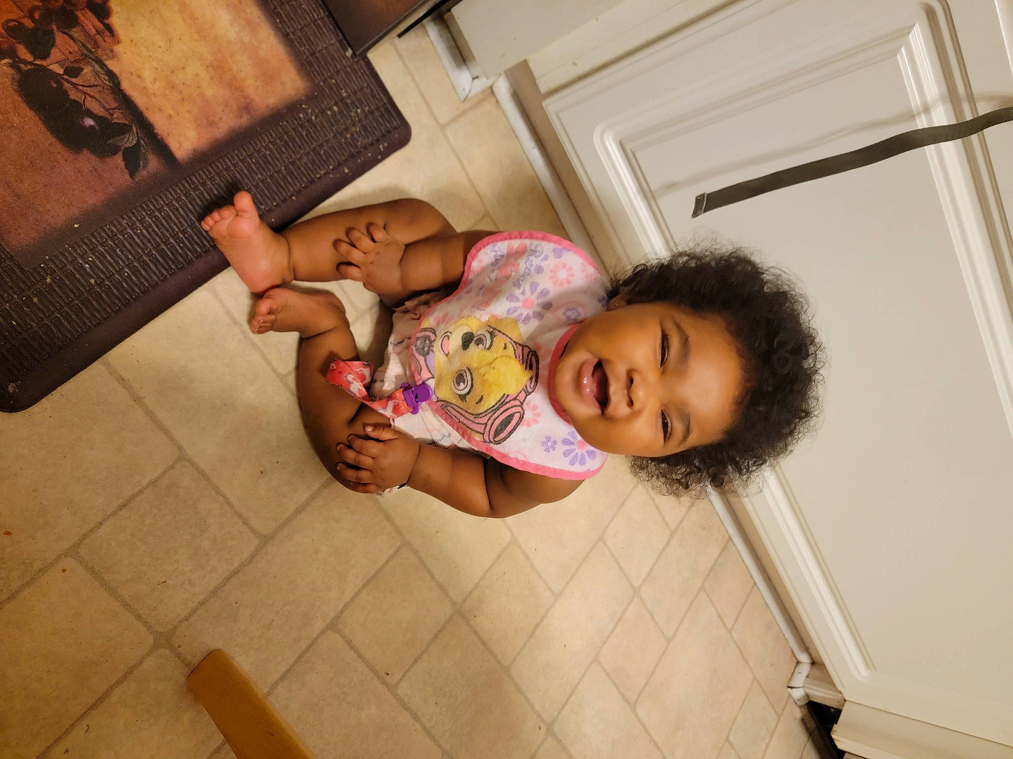 Anastasia is registered to the contest to win money with this photo: abdomen, baby, child, comfort, couch, floor, flooring, fun, happy, hardwood, human_leg, leisure, person, room, sitting, thigh, toddler, vacation, wood