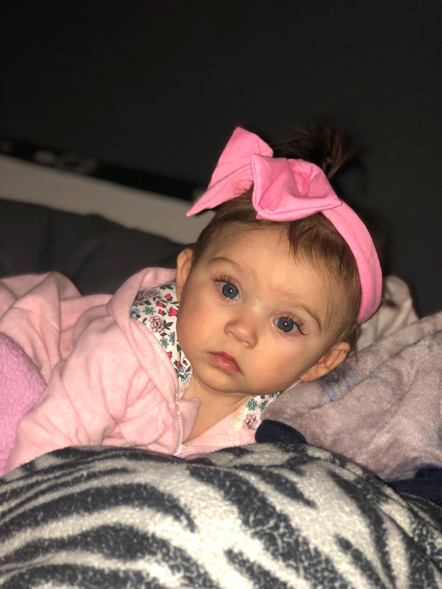 Everleigh is registered to the contest to win money with this photo: baby, beauty, cheek, child, ear, eye, face, fun, head, headgear, person, pink, skin, smile, toddler