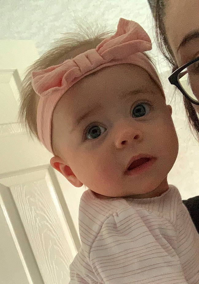 Pippa is registered to the contest to win money with this photo: baby, baby_toddler_clothing, cap, cheek, chin, ear, eye, eyelash, face, happy, head, headgear, headpiece, headwear, iris, lip, nose, person, pink, skin