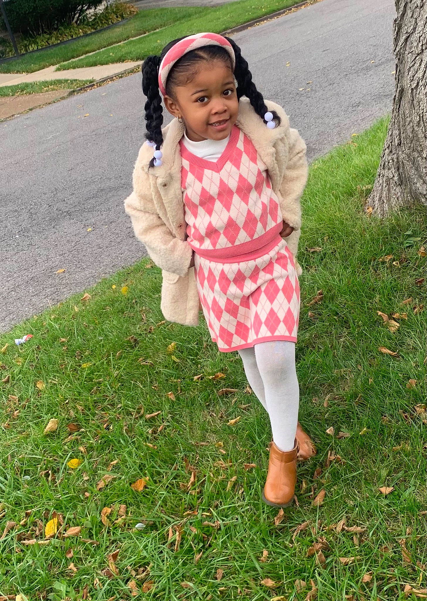 Emiliana joined the competition — help win amazing prizes! child, costume, fashion_accessory, fun, garden, grass, happy, joy, lawn, leisure, magenta, pattern, people_in_nature, person, plaid, plant, polka_dot, recreation, sleeve, toddler