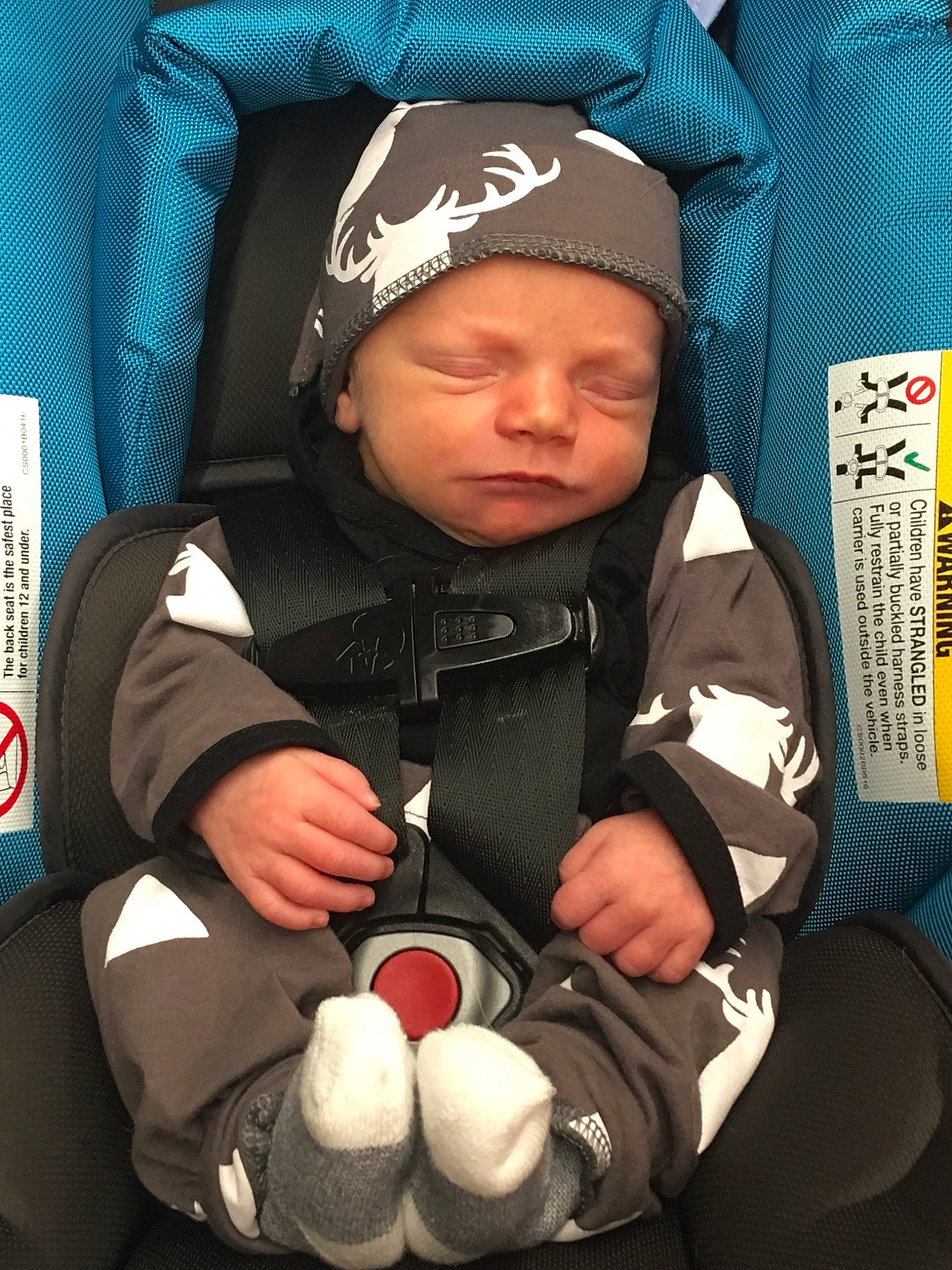 Oakley is registered to the contest to win money with this photo: baby, baby_in_car_seat, child, headwear, person, toddler