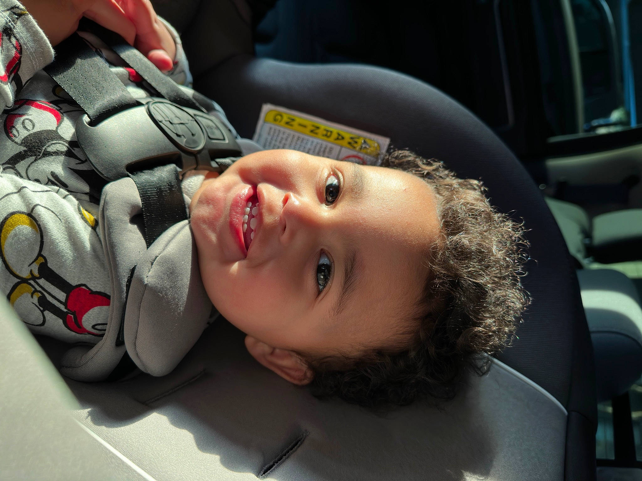 Greyson is registered to the contest to win money with this photo: auto_part, automotive_design, automotive_exterior, automotive_lighting, automotive_tire, car, car_seat, carmine, child, family_car, flash_photography, happy, luxury_vehicle, motor_vehicle, person, personal_luxury_car, personal_protective_equipment, smile, toddler, vehicle