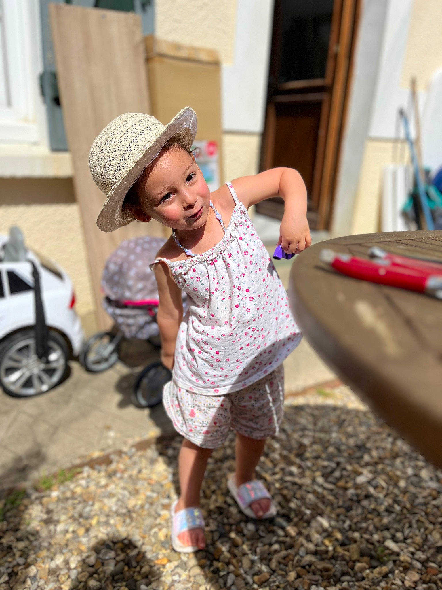 Leya participe au concours pour gagner de l'argent avec cette photo : asphalt, automotive_design, automotive_tire, cap, cool, fun, happy, hat, headwear, leisure, person, product, road, sandal, sidewalk, standing, style, summer, sun_hat, tire