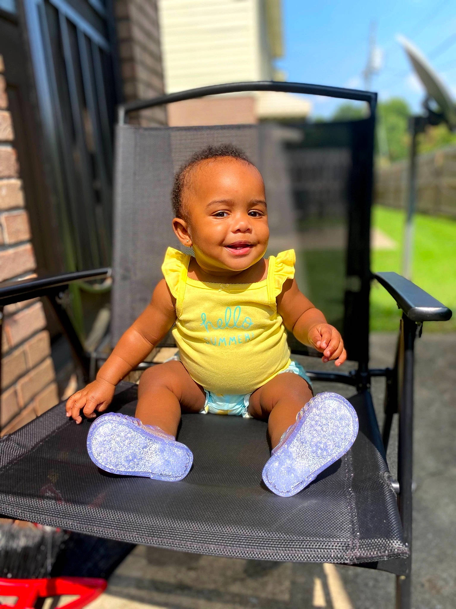 Kalei is registered to the contest to win money with this photo: baby, baby_toddler_clothing, child, city, electric_blue, face, fun, grass, happy, leisure, outdoor_furniture, outdoor_play_equipment, person, play, recreation, shorts, sitting, sleeve, t_shirt, toddler