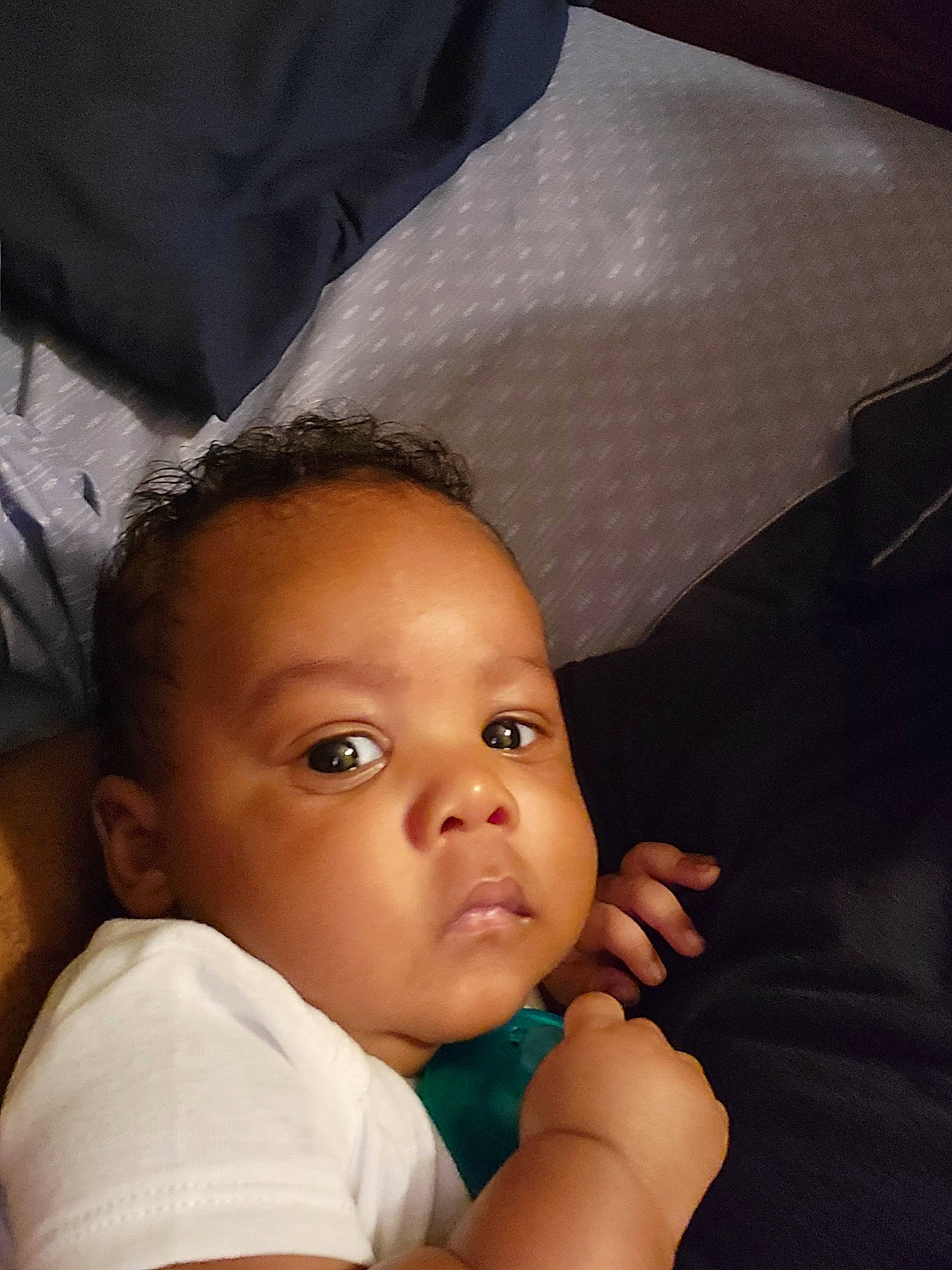 Diovel is registered to the contest to win money with this photo: baby, baby_toddler_clothing, black_hair, cheek, child, comfort, eye, eyelash, face, flash_photography, gesture, happy, head, iris, lip, nose, person, skin, smile, thumb