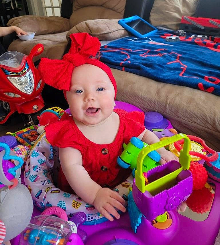 Skylar Grace is registered to the contest to win money with this photo: baby, baby_products, baby_toddler_clothing, child, electric_blue, event, fun, happy, headwear, leisure, magenta, person, pink, play, product, purple, red, smile, t_shirt, textile