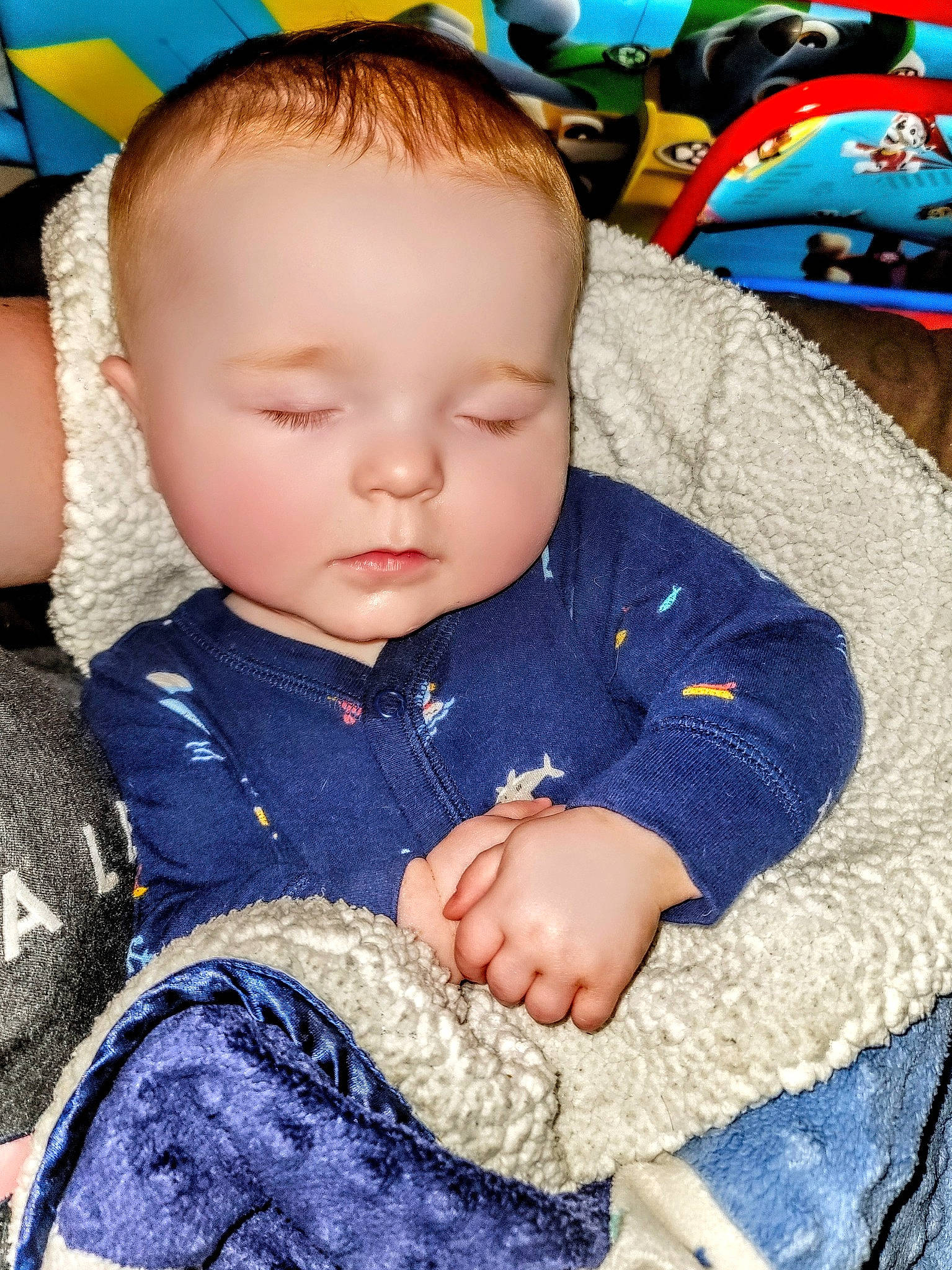 Charlie is registered to the contest to win money with this photo: baby, baby_toddler_clothing, blue, cheek, eye, fun, hairstyle, happy, head, headgear, human_body, iris, nose, organ, person, photograph, product, skin, sleeve, toddler