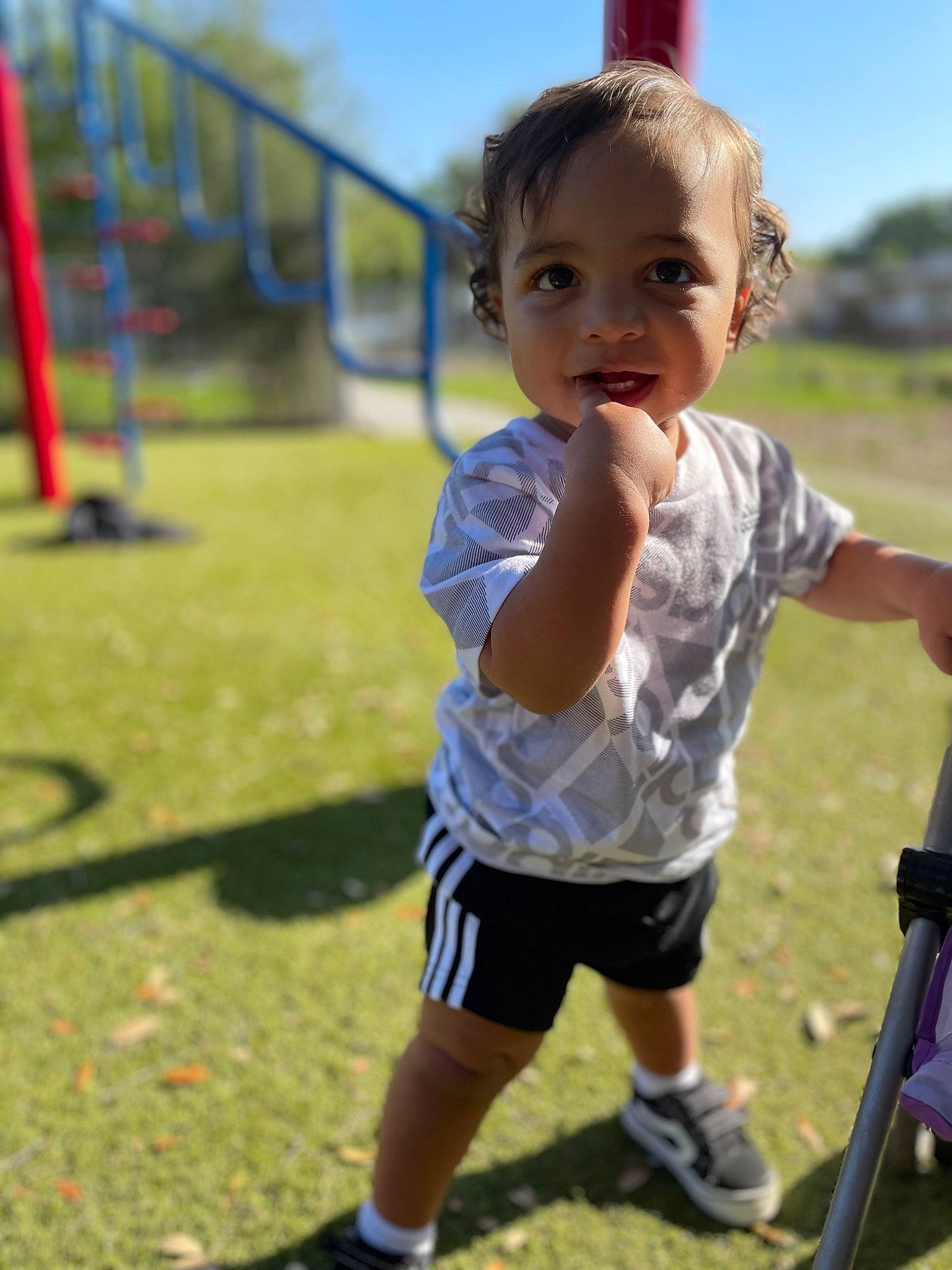 Kevin Jr is registered to the contest to win money with this photo: baby, baby_toddler_clothing, child, city, fun, grass, happy, knee, leisure, pattern, people_in_nature, person, play, recreation, shorts, sky, sleeve, smile, summer, t_shirt