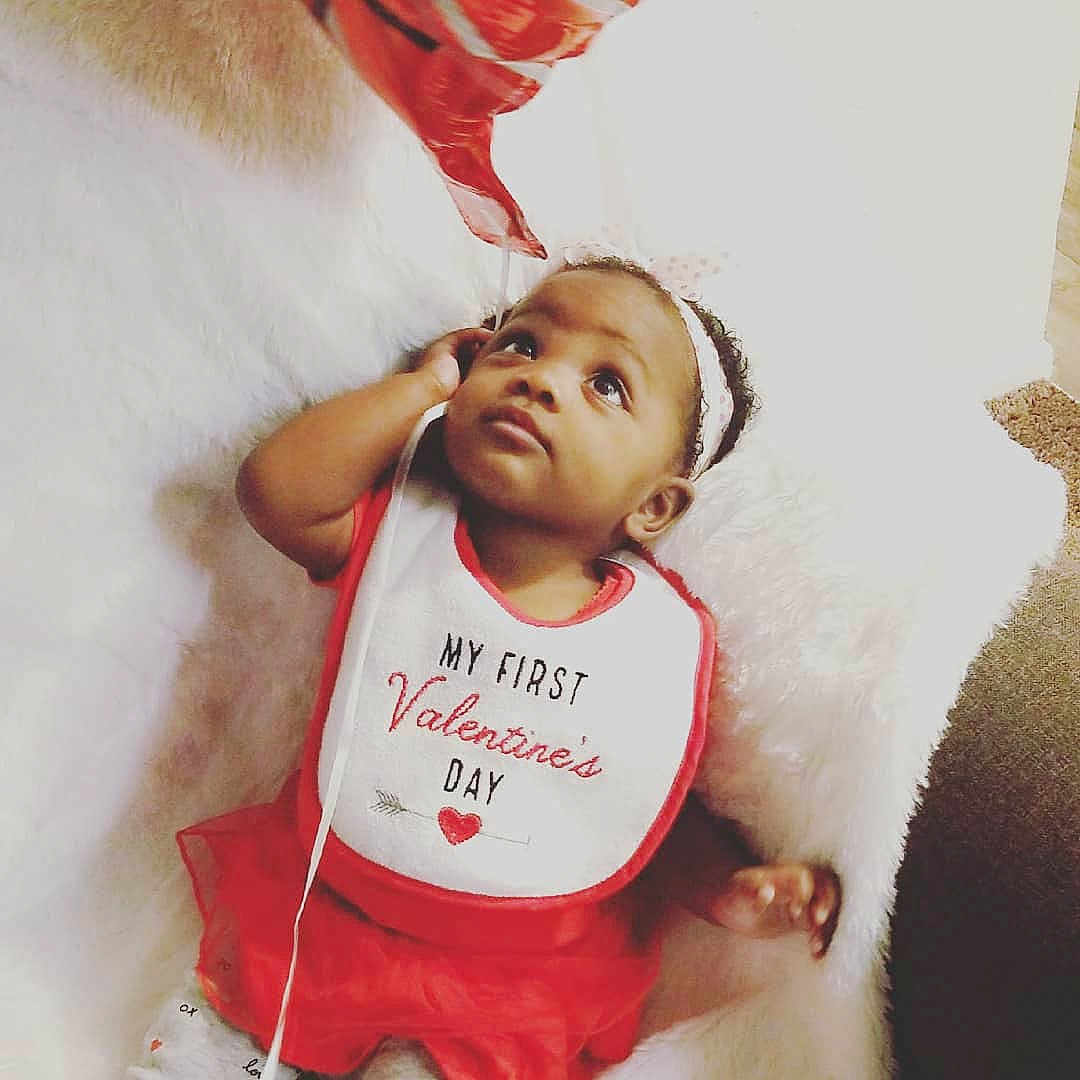 Kaci joined the competition — help win amazing prizes! baby, cheek, child, cool, daughter, facial_expression, fictional_character, fun, gesture, happy, lip, nose, person, red, smile, t_shirt, toddler, top