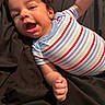 Kashius joined the competition — help win amazing prizes! arm, baby, black_blanket, child, curly_hair, cute, expression, face, happy, indoor, infant, lying_down, mouth_open, person, playful, portrait, skin, smiling, striped_onesie, young_child