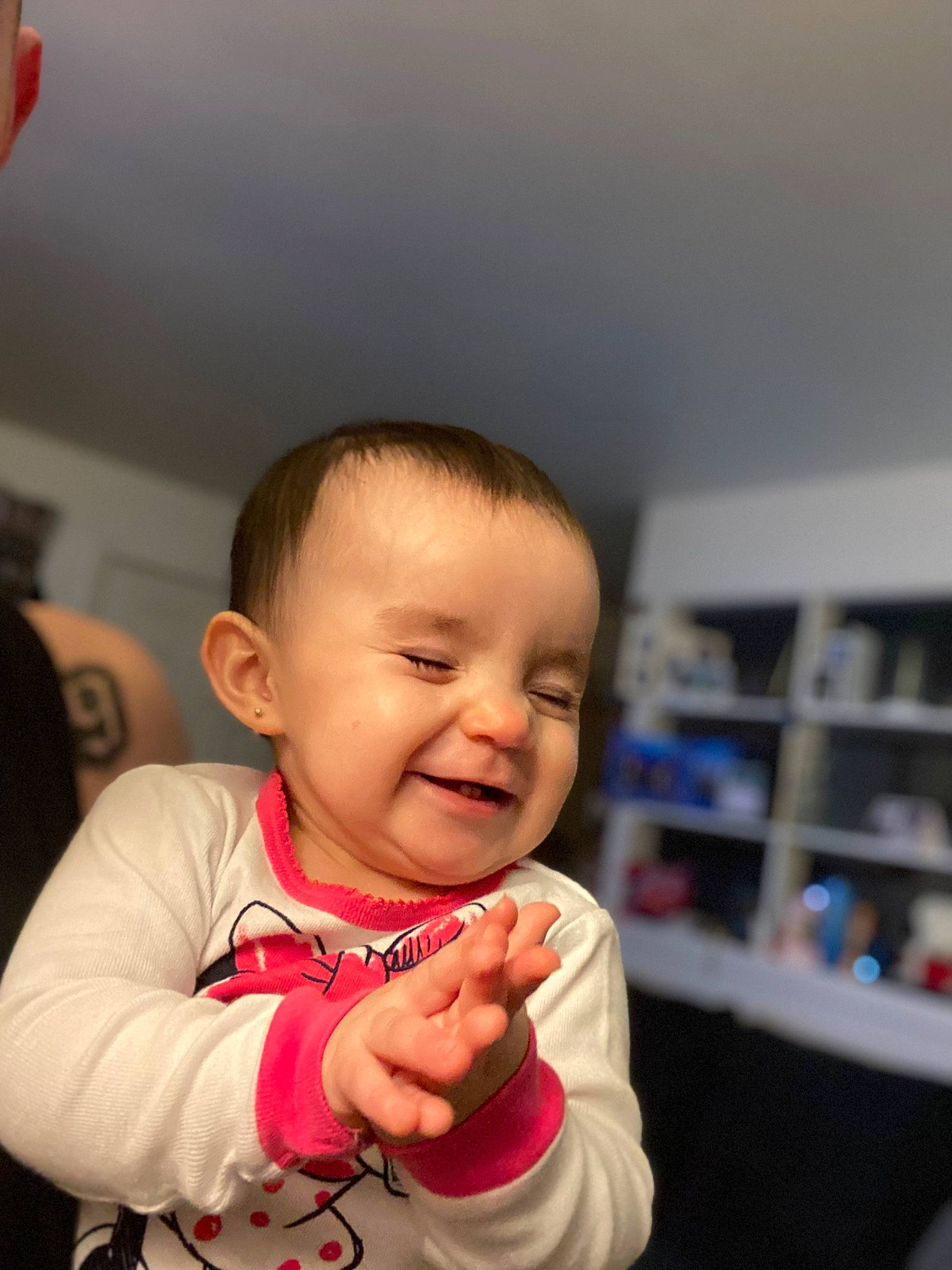 Armani joined the competition — help win amazing prizes! baby, baby_toddler_clothing, bookcase, cheek, child, chin, ear, fun, gesture, happy, iris, mouth, nose, person, shelf, sitting, skin, sleeve, smile, thumb