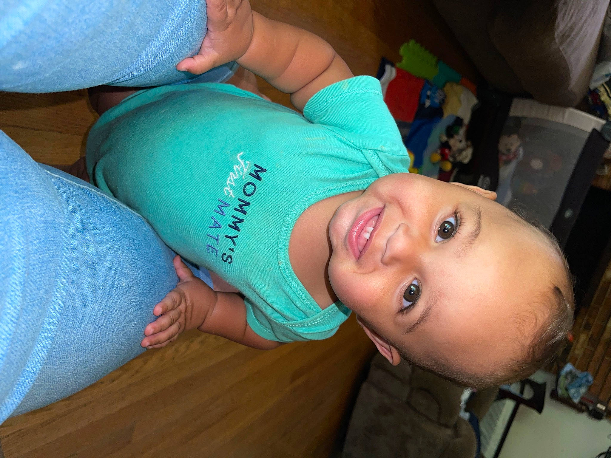 Kabari is registered to the contest to win money with this photo: abdomen, blue, cheek, child, comfort, elbow, electric_blue, finger, fun, happy, hat, human_leg, joy, mouth, nose, person, room, skin, smile, t_shirt