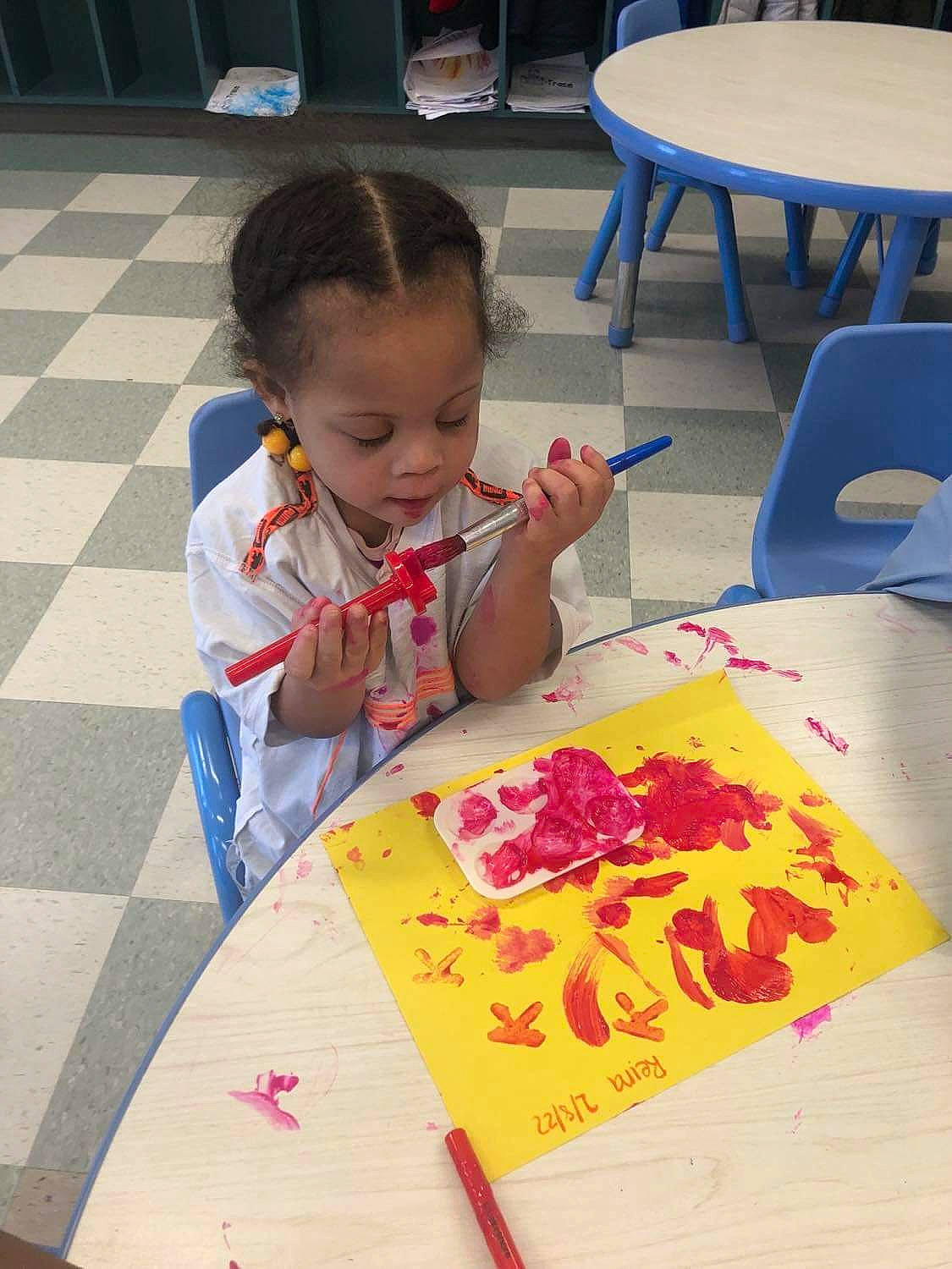 Reina joined the competition — help win amazing prizes! adaptation, art, artist, chair, child, child_art, event, flooring, fun, furniture, games, handwriting, leisure, paint, person, play, recreation, red, sharing, table