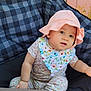 Ashlee joined the competition — help win amazing prizes! baby, child, hat, pink, floral, bib, sitting, outdoor, checkered_chair, curious, face, cute, infant, comfortable, clothing, person, natural_light, portrait, young_child, summer