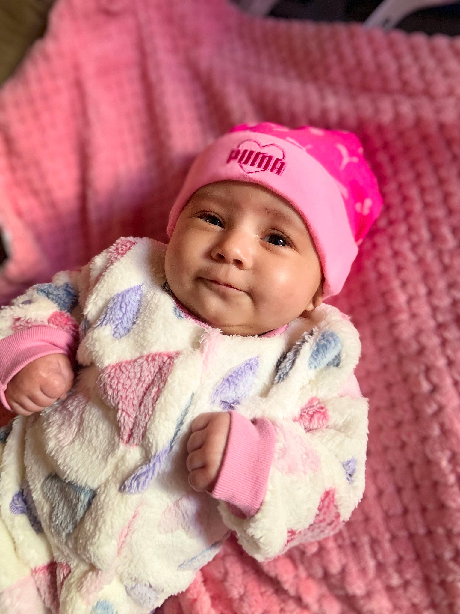 Aubrielle is registered to the contest to win money with this photo: baby, baby_toddler_clothing, cap, cheek, child, eye, finger, happy, head, headgear, headwear, knit_cap, lip, magenta, nose, person, pink, product, skin, sleeve