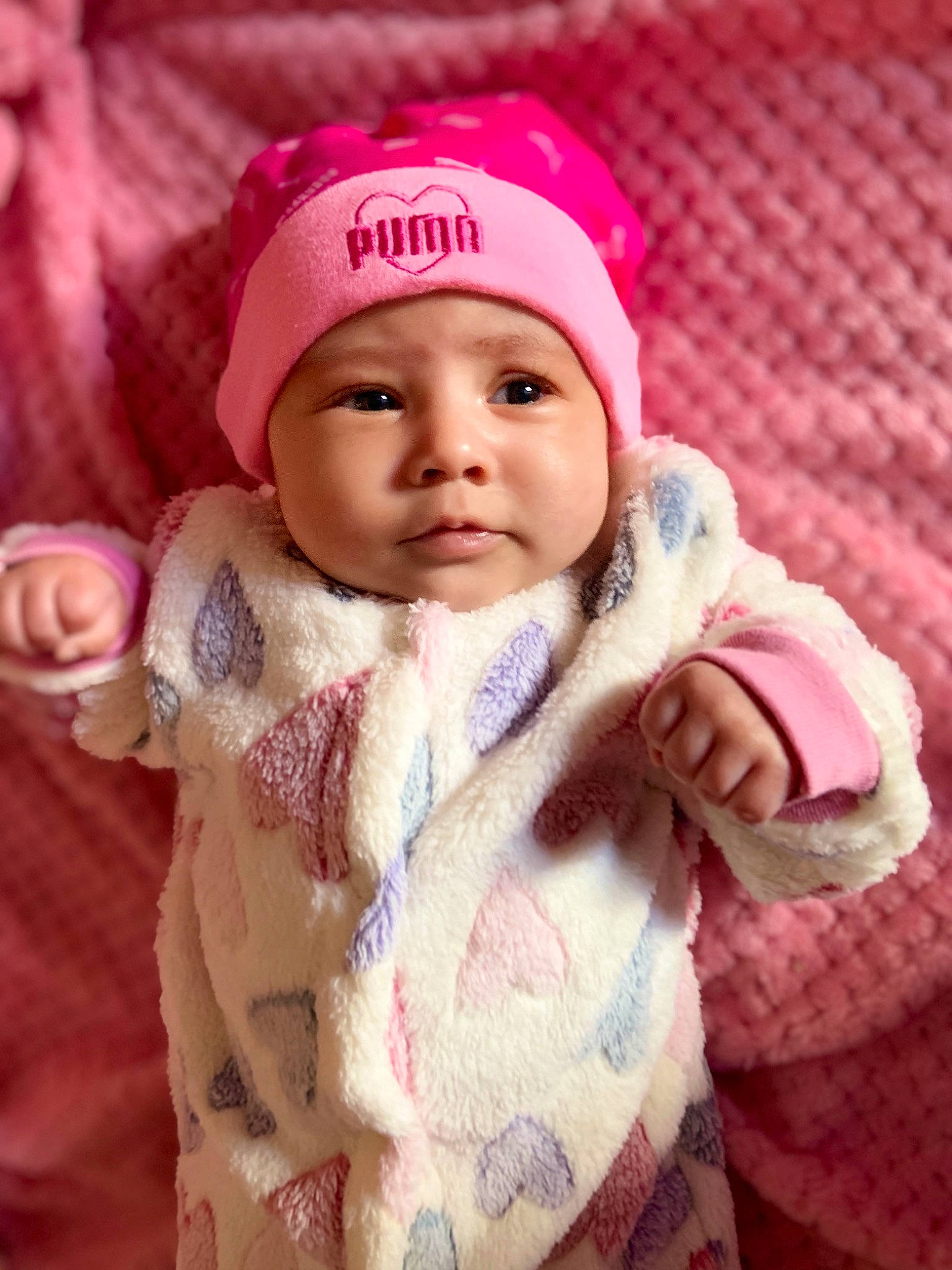 Aubrielle is registered to the contest to win money with this photo: baby, baby_toddler_clothing, cap, cheek, chin, eye, face, finger, happy, headgear, headwear, knit_cap, lip, magenta, nose, person, pink, skin, sleeve, toddler
