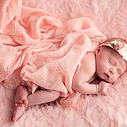 Ellie joined the competition — help win amazing prizes! newborn, baby, sleeping, infant, portrait, floral_headband, pink, blanket, fabric, roses, floral, peaceful, lying_down, closeup, photography, soft_lighting, adorable, nursery, skin, feet