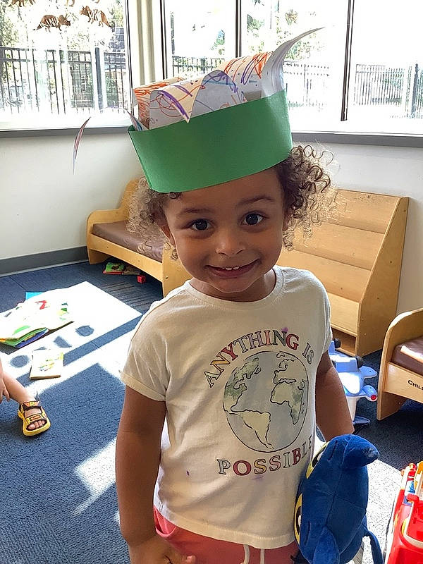 Izzy joined the competition — help win amazing prizes! child, costume_hat, event, fashion_accessory, fictional_character, flooring, fun, happy, headwear, holiday, joy, party, party_hat, party_supply, person, play, room, shorts, smile, t_shirt