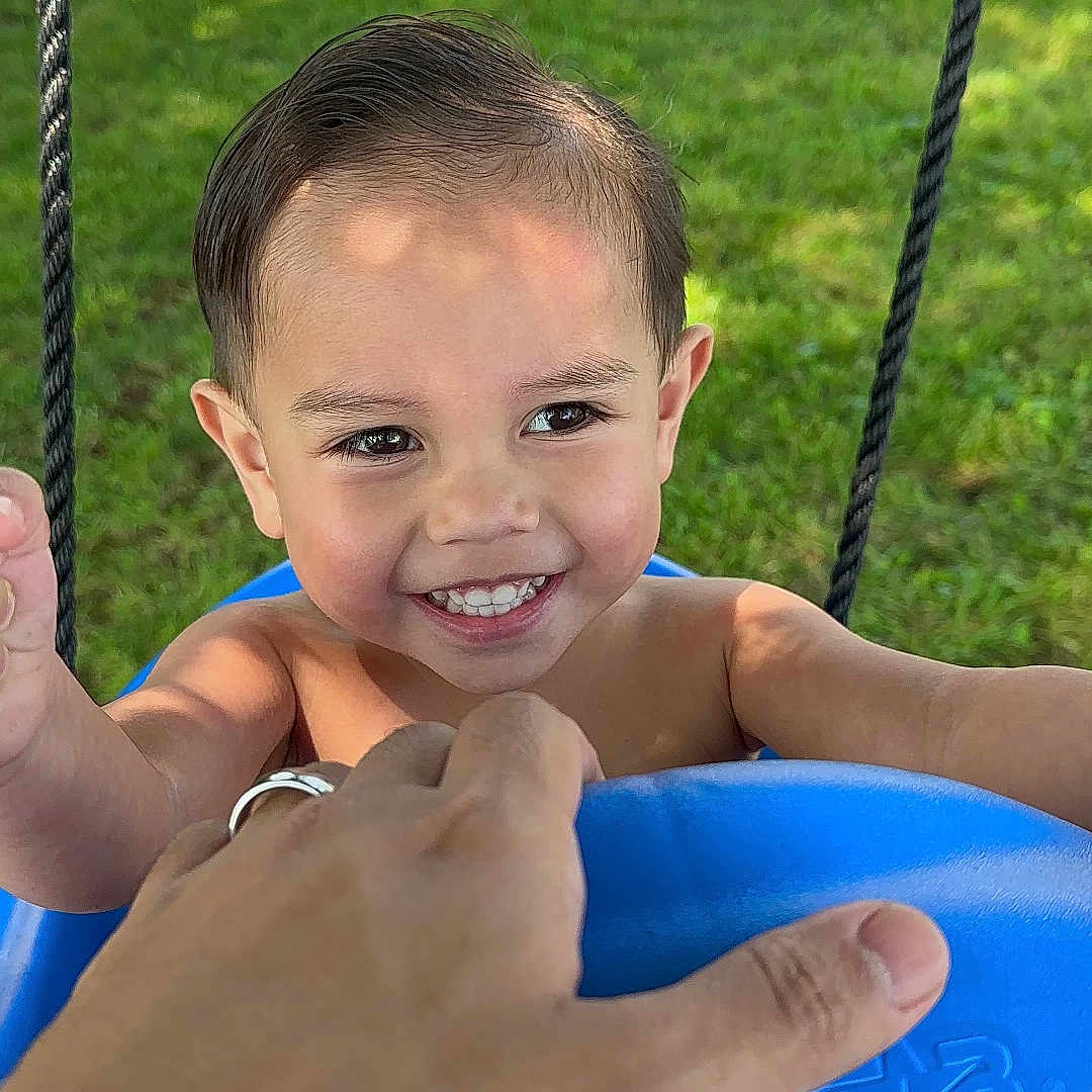 Dante joined the competition — help win amazing prizes! baby, bodypart, face, finger, grass, hand, head, machine, nature, outdoorplayarea, outdoors, park, person, photography, plant, playarea, portrait, summer, toy, wheel