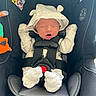 Maximillian joined the competition — help win amazing prizes! newborn, baby, car_seat, mittens, hat, sleeping, infant, safety_straps, clothing, cute, cozy, closeup, indoor, child, person, seat, warning_label, protection, soft, resting