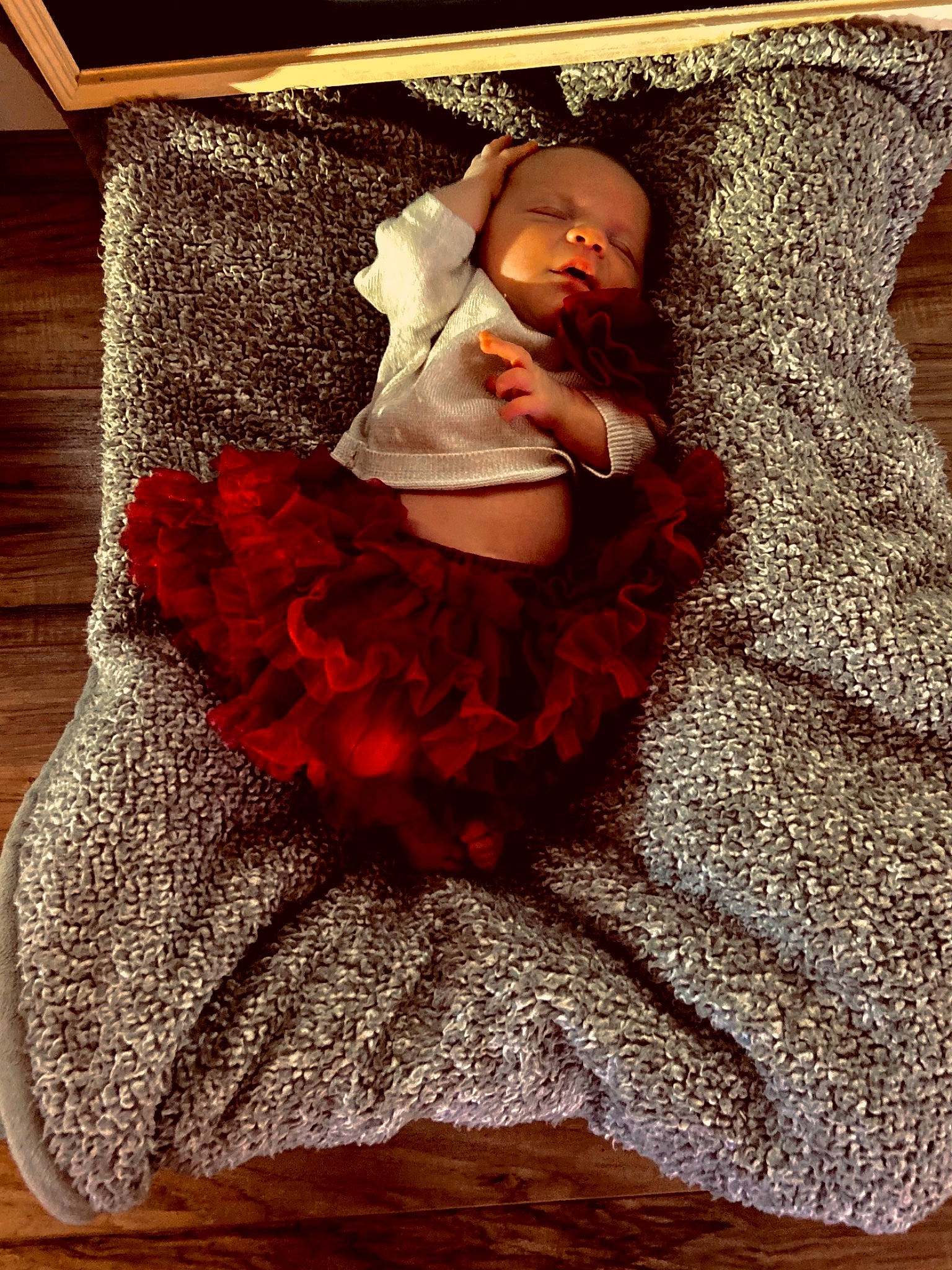 Emilee is registered to the contest to win money with this photo: abdomen, baby_toddler_clothing, bridal_accessory, comfort, embellishment, event, fashion_accessory, fashion_design, flash_photography, flooring, fur, hardwood, headpiece, linens, pattern, person, ruffle, sleeve, textile, waist