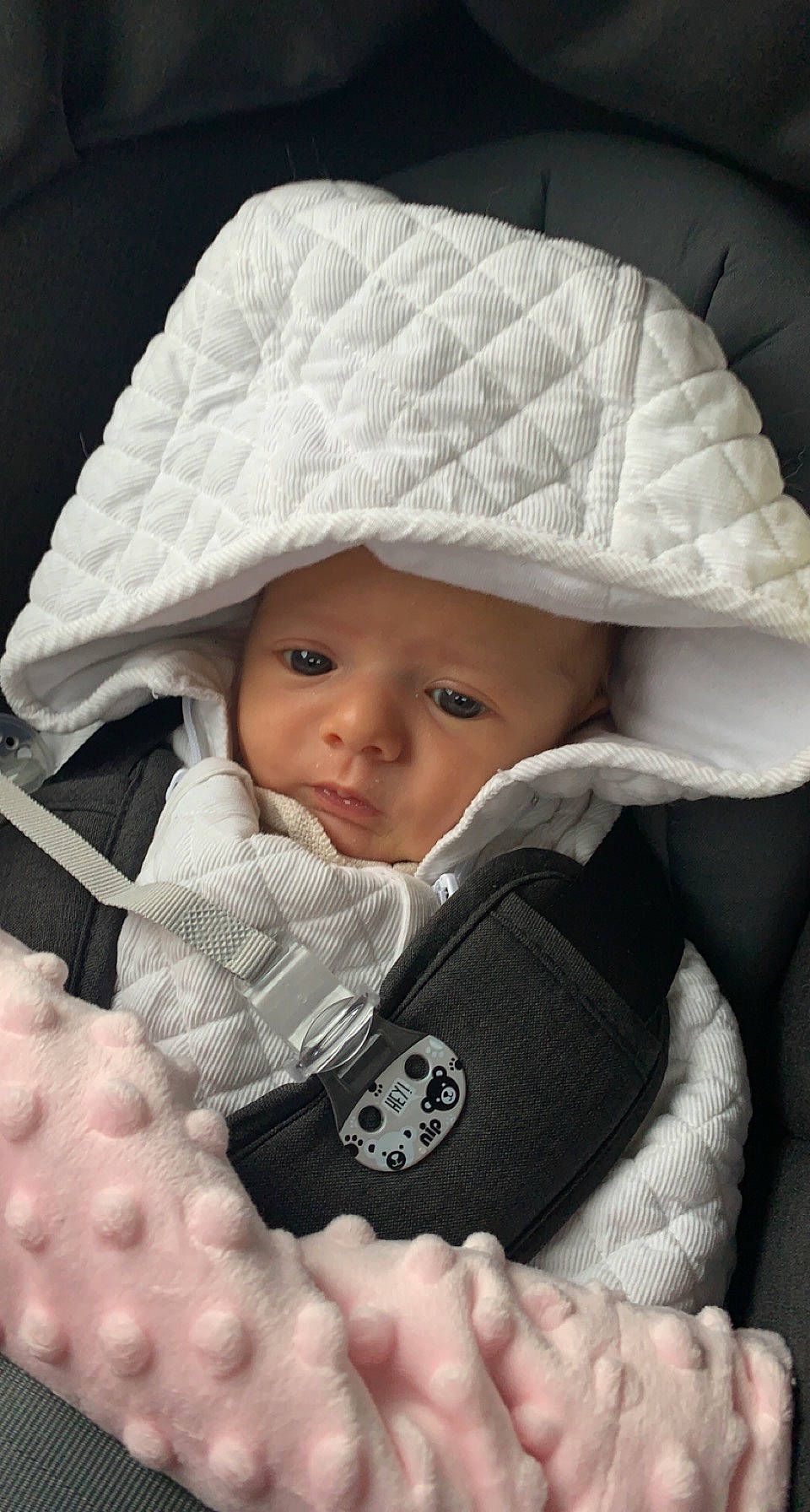 Elena participe au concours pour gagner de l'argent avec cette photo : baby, baby_safety, baby_toddler_clothing, cap, cheek, comfort, eyebrow, face, gesture, hat, headgear, headwear, iris, lip, outerwear, person, photograph, skin, sleeve, textile