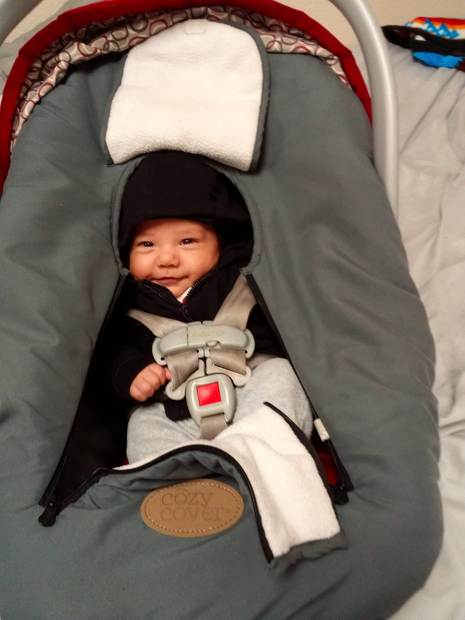 Richard joined the competition — help win amazing prizes! baby, baby_carriage, baby_products, baby_toddler_clothing, cheek, child, comfort, event, eye, fun, headgear, headwear, lap, linens, outerwear, person, product, sitting, smile, textile