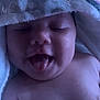 baby, tongue_out, towel, hood, skin, cute, infant, sleepy, closeup, soft_texture, child, adorable, wrapped, face, mouth, mouth_open, expression, lying_down, indoors, newborn