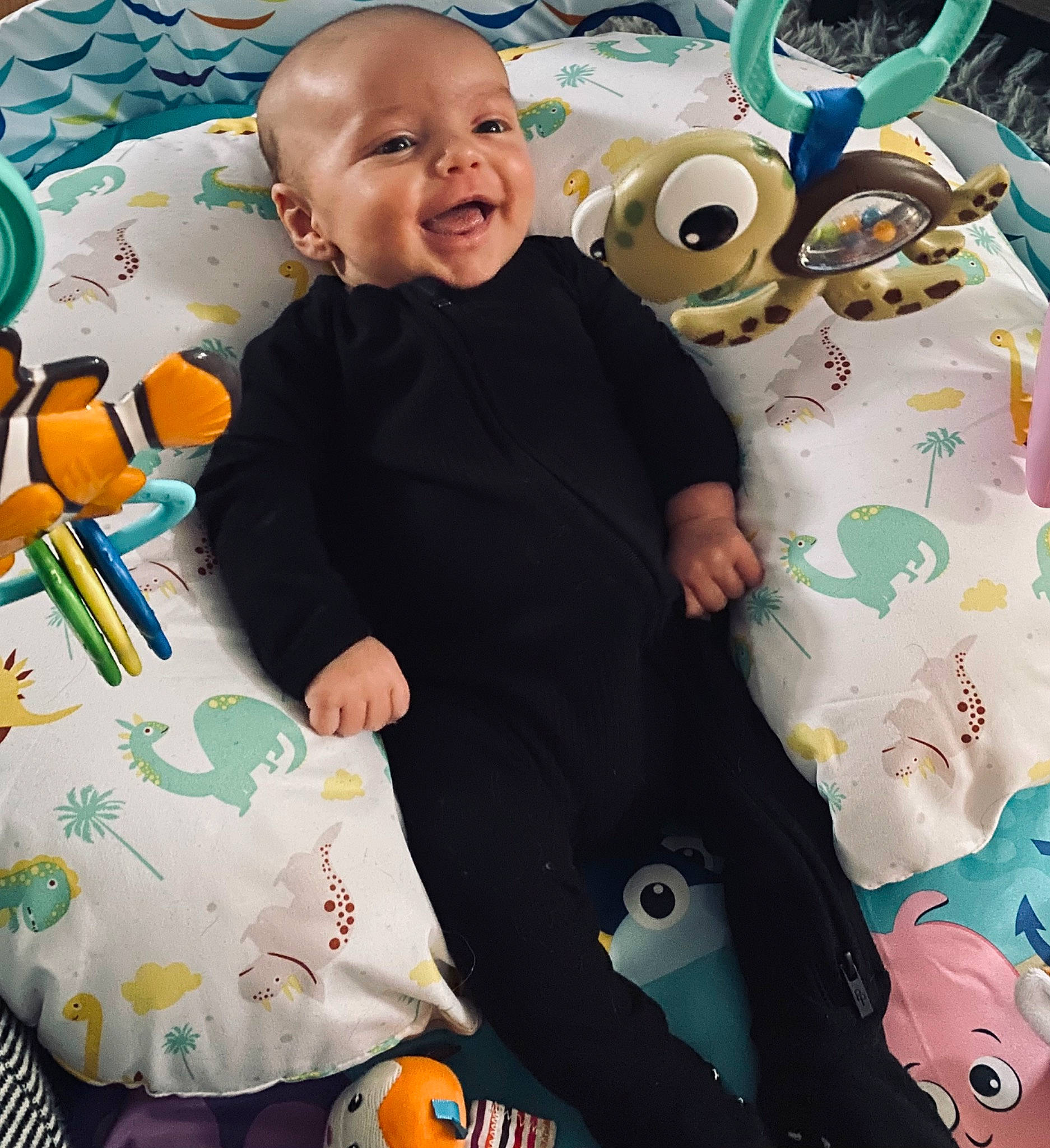 Lucas Broadbent joined the competition — help win amazing prizes! baby, baby_products, baby_toddler_clothing, child, event, facial_expression, fun, green, happy, mammal, orange, organ, people, person, photograph, product, smile, snapshot, textile, toddler