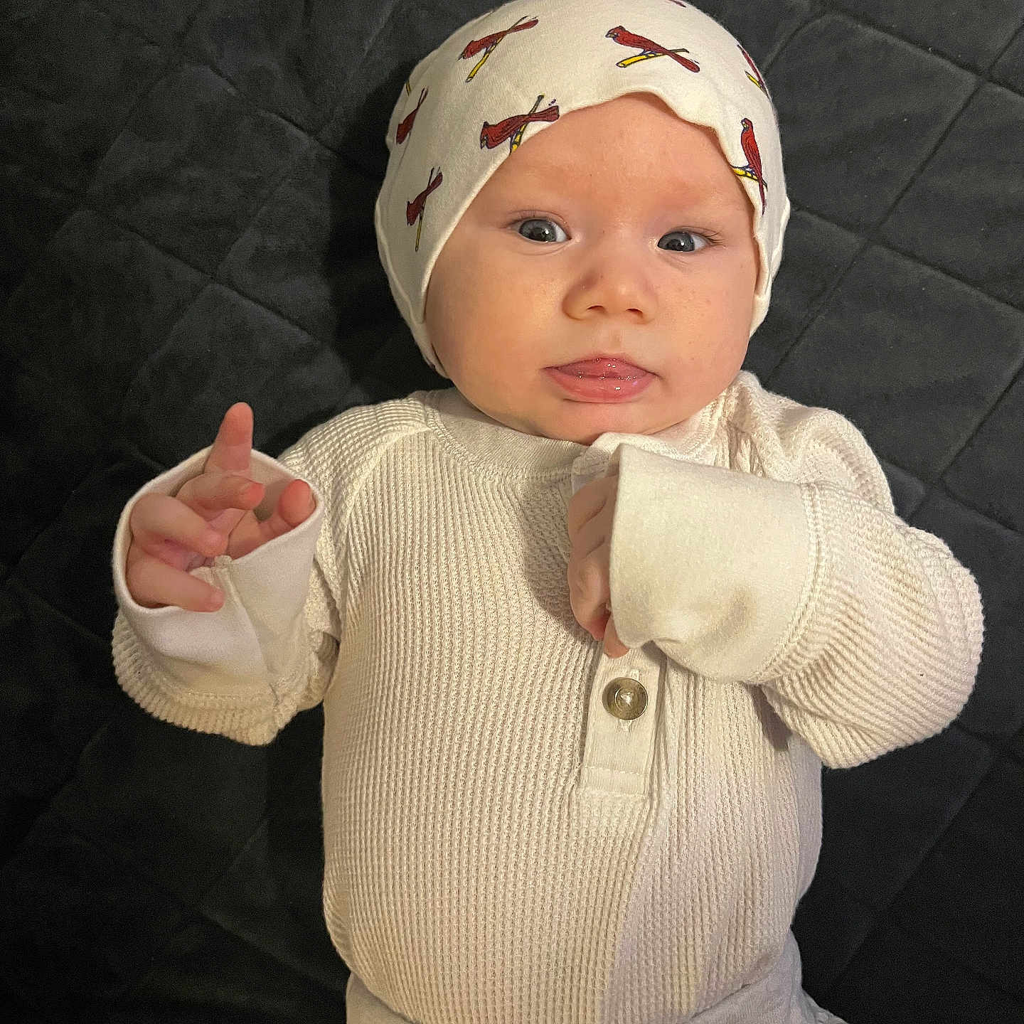 Eren is registered to the contest to win money with this photo: baby, beanie, bodypart, bonnet, cap, clothing, face, finger, hand, hat, head, hood, knitwear, longsleeve, newborn, pants, person, photography, portrait, sweater