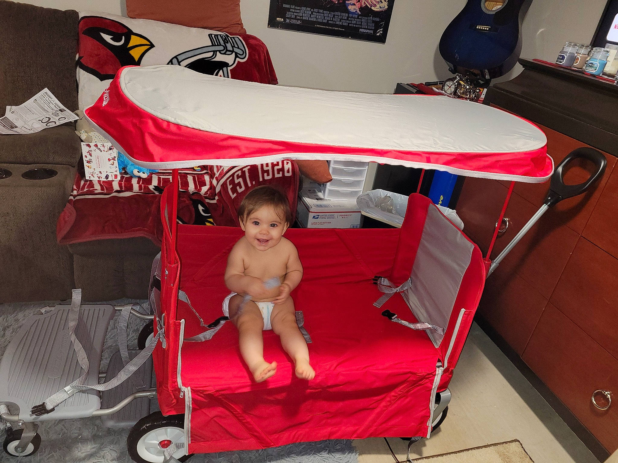 Sascha Frye-robey joined the competition — help win amazing prizes! baby_products, child, comfort, fun, human_leg, joy, lap, leisure, motor_vehicle, outdoor_furniture, person, product, recreation, red, room, shorts, sitting, sunlounger, thigh, toddler