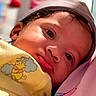Lola joined the competition — help win amazing prizes! baby, child, face, hat, blanket, yellow, winnie_the_pooh, close_up, portrait, cute, resting, soft, fabric, indoors, person, skin, expression, infant, young, headwear