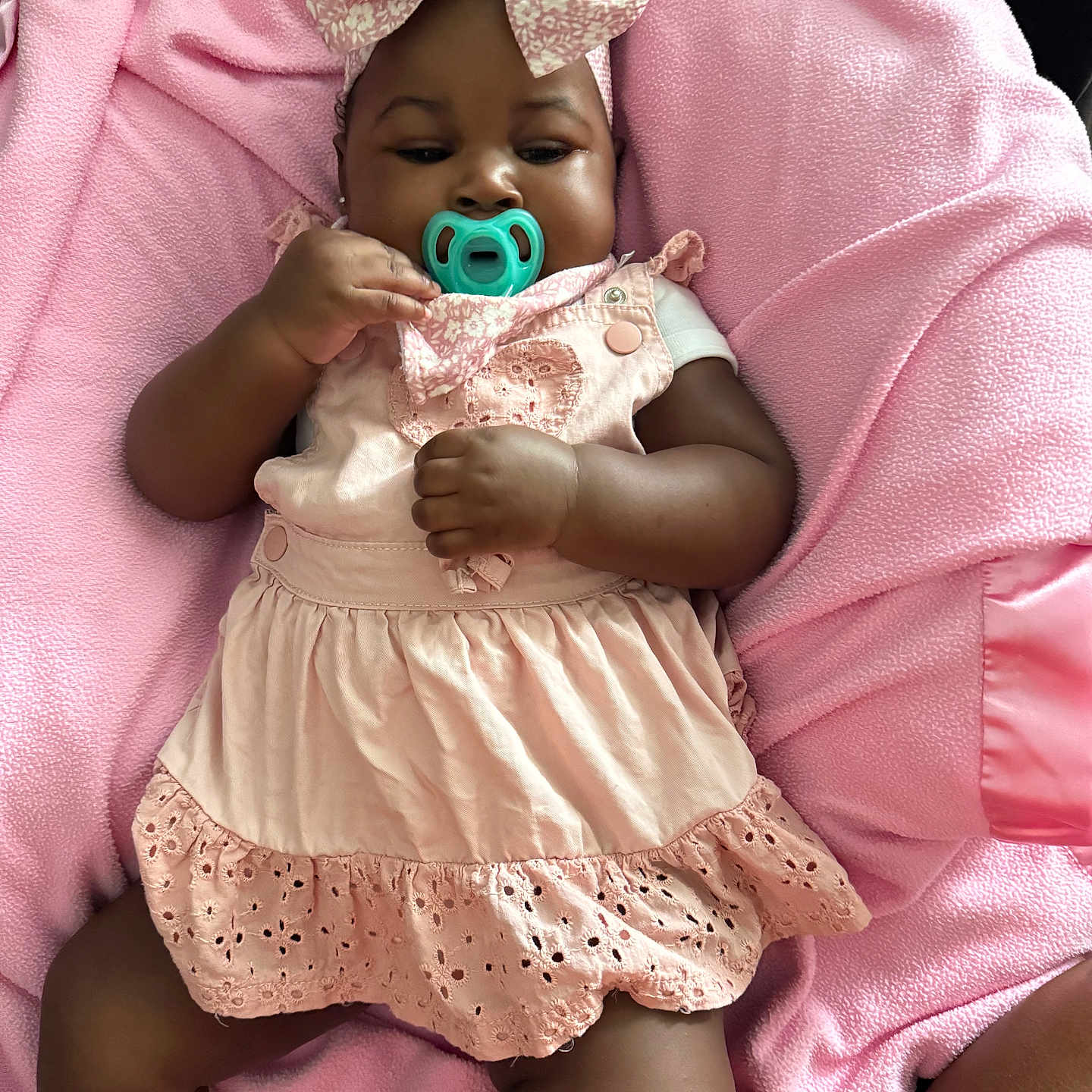 Kayleigh joined the competition — help win amazing prizes! adorable, baby, blanket, bow, child, clothing, comfort, cute, hand, headband, indoors, infant, legs, lying_down, pacifier, pink_dress, portrait, relaxation, skin, soft_fabric