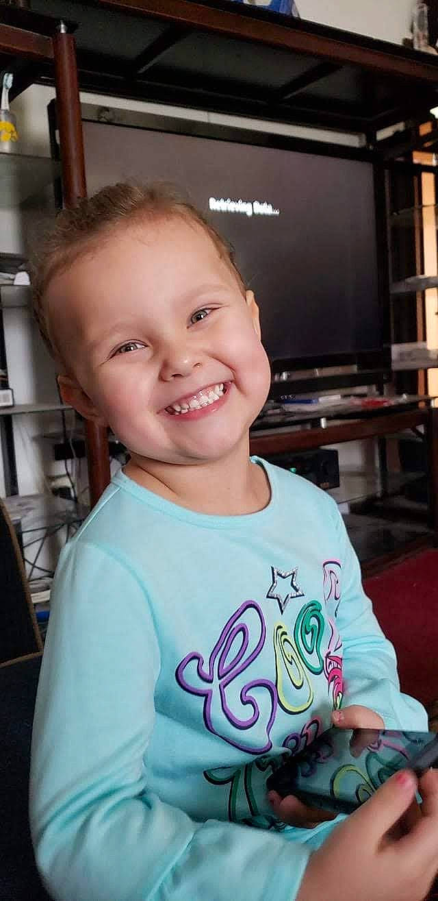 Faith is registered to the contest to win money with this photo: baby, cheek, child, chin, ear, face, facial_expression, forehead, fun, happy, head, joy, laugh, organ, person, skin, smile, t_shirt, toddler, tooth