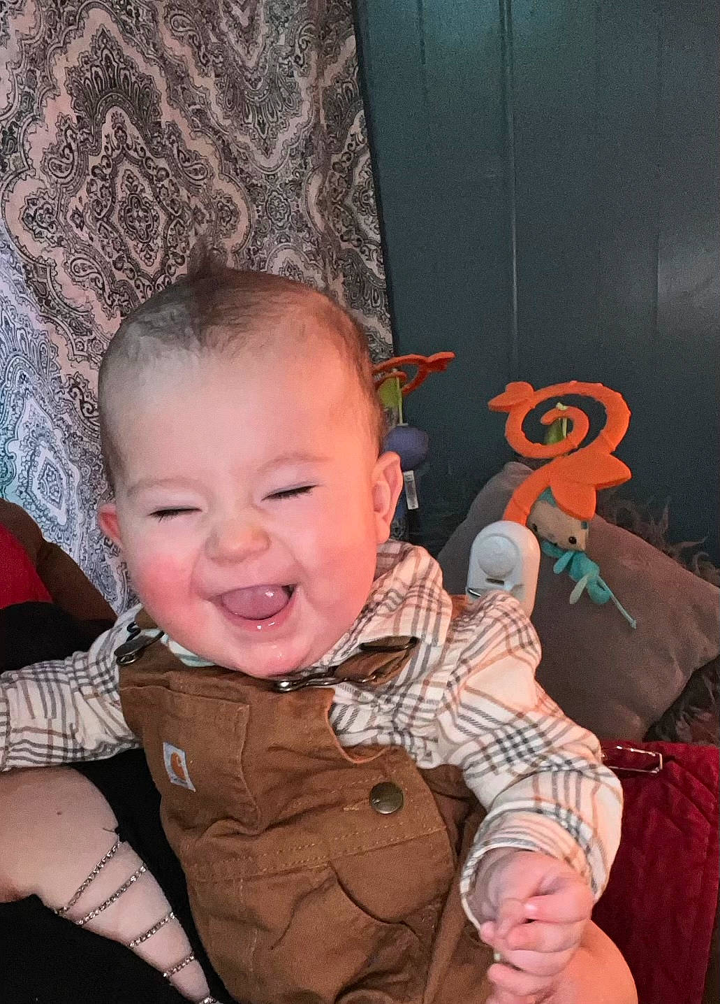 Zaiden is registered to the contest to win money with this photo: arm, baby, baby_toddler_clothing, cheek, eye, finger, hairstyle, hand, happy, head, headgear, iris, mammal, mouth, nose, person, pink, skin, smile, textile