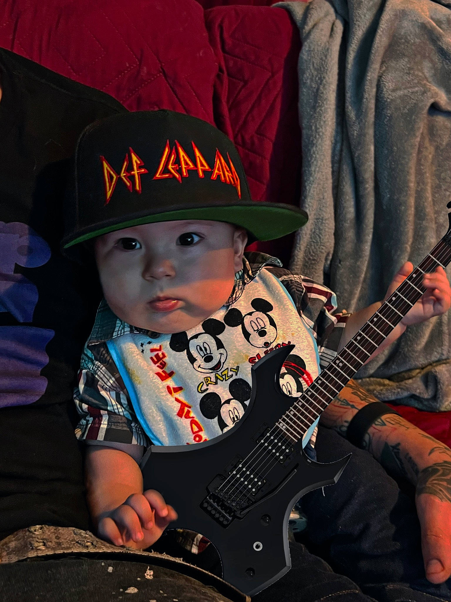 Zaiden joined the competition — help win amazing prizes! baby, baseball_cap, cap, cool, costume_hat, electric_guitar, guitar, guitar_accessory, guitarist, hat, headgear, headwear, musical_instrument, musical_instrument_accessory, musician, person, personal_protective_equipment, plucked_string_instruments, string_instrument, string_instrument_accessory