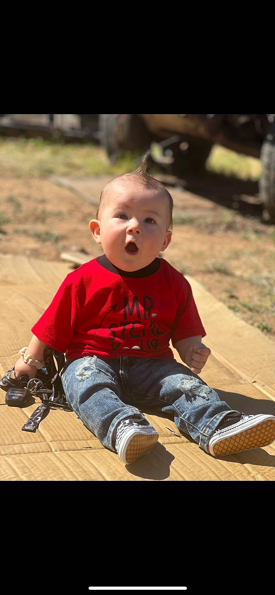Zaiden is registered to the contest to win money with this photo: baby, baby_toddler_clothing, carmine, child, flooring, fun, grass, happy, jeans, leisure, pattern, person, recreation, sitting, skin, smile, soil, surprise, t_shirt, toddler