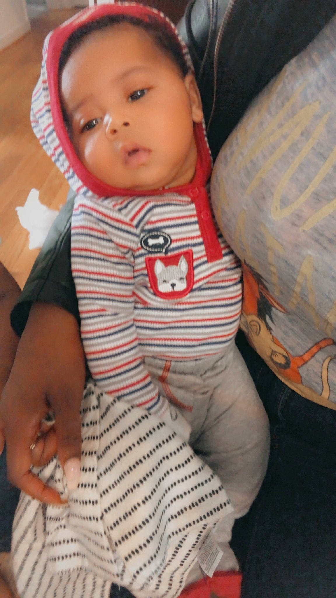 Kareem is registered to the contest to win money with this photo: baby, baby_toddler_clothing, cheek, chin, comfort, cool, eye, face, facial_expression, finger, hairstyle, head, human_body, lip, mouth, nose, organ, person, skin, sleeve