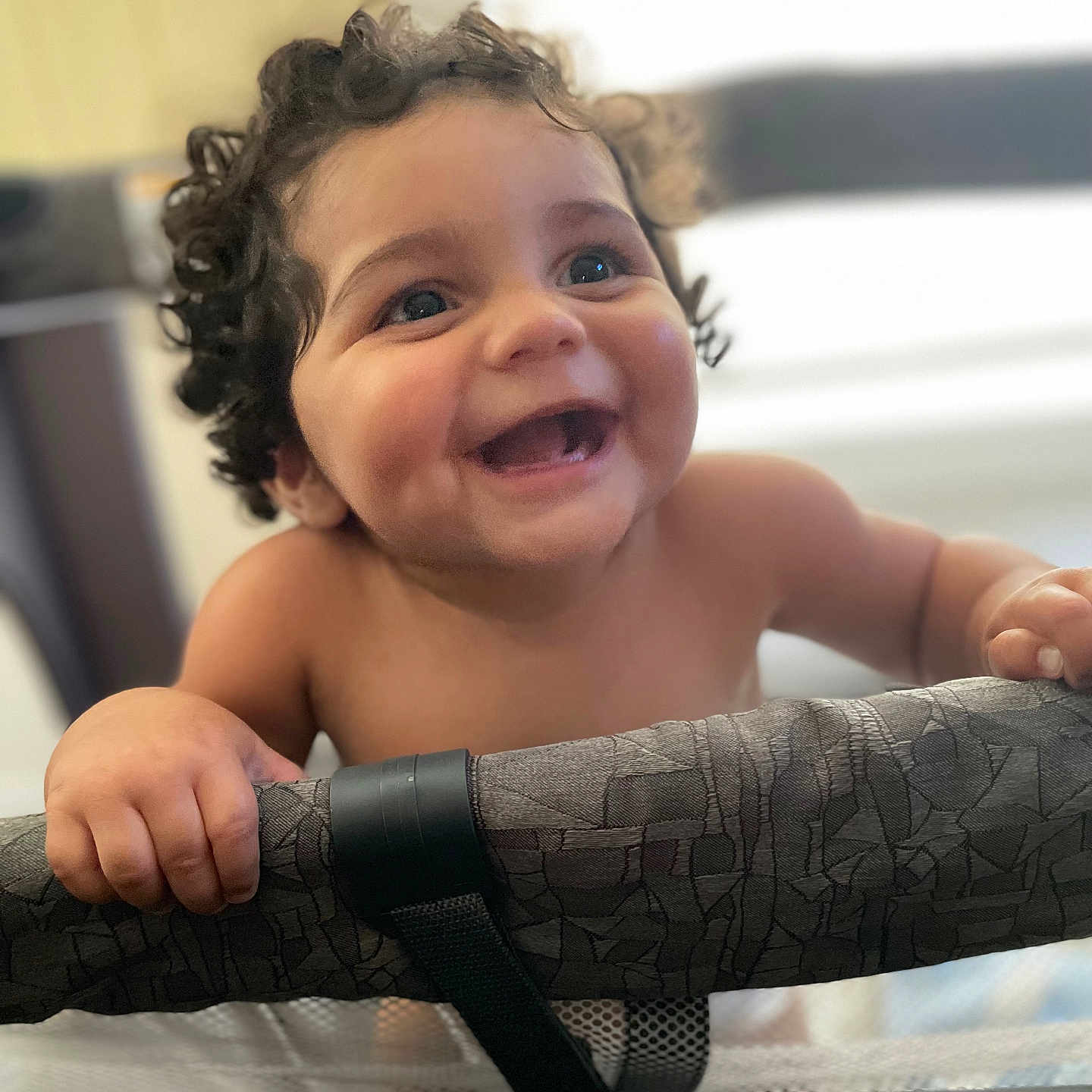 Javien joined the competition — help win amazing prizes! accessories, arm, baby, babylaughing, bodypart, clothing, dress, face, finger, hand, happy, head, laughing, mouth, person, photography, portrait, smile, strap, teeth