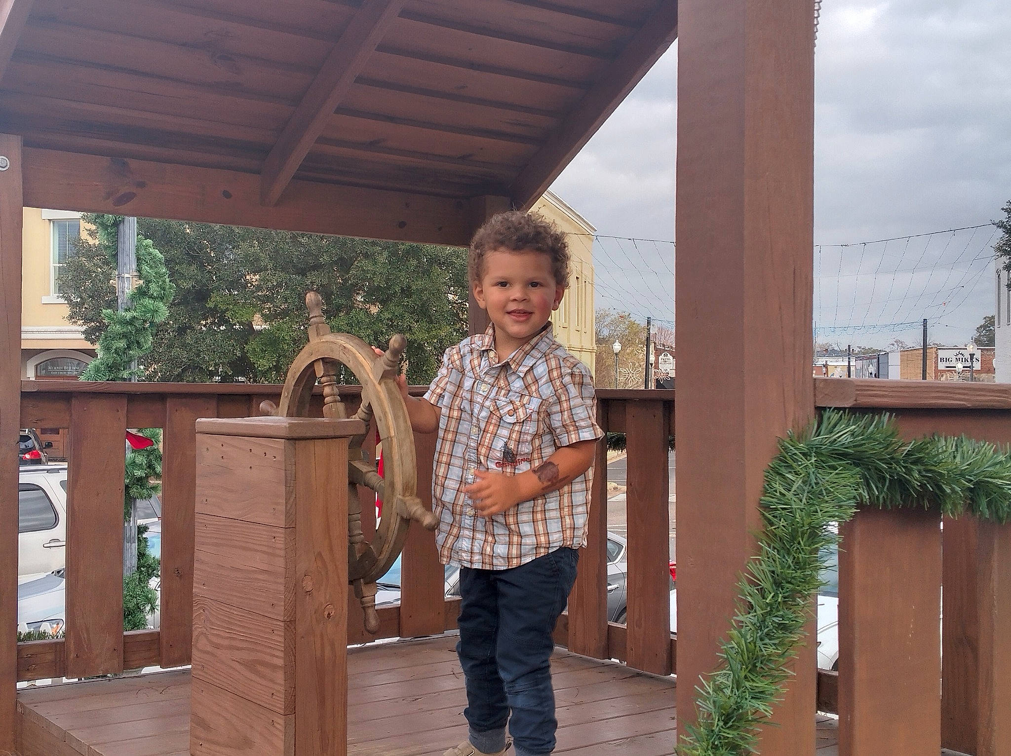 Bryson joined the competition — help win amazing prizes! deck, flooring, fun, hardwood, home, house, joy, leisure, outdoor_structure, person, plant, roof, room, shade, sky, smile, standing, toddler, travel, tree