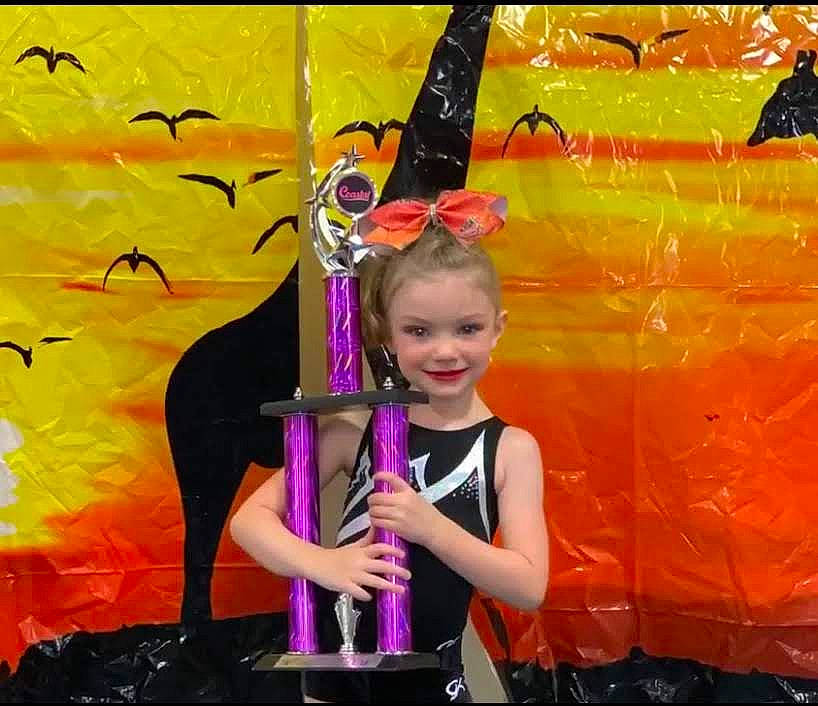 Carly joined the competition — help win amazing prizes! art, artist, child, dress, entertainment, event, fun, happy, joy, leisure, magenta, musical_instrument, painting, performance, performance_art, performing_arts, person, public_event, recreation, smile