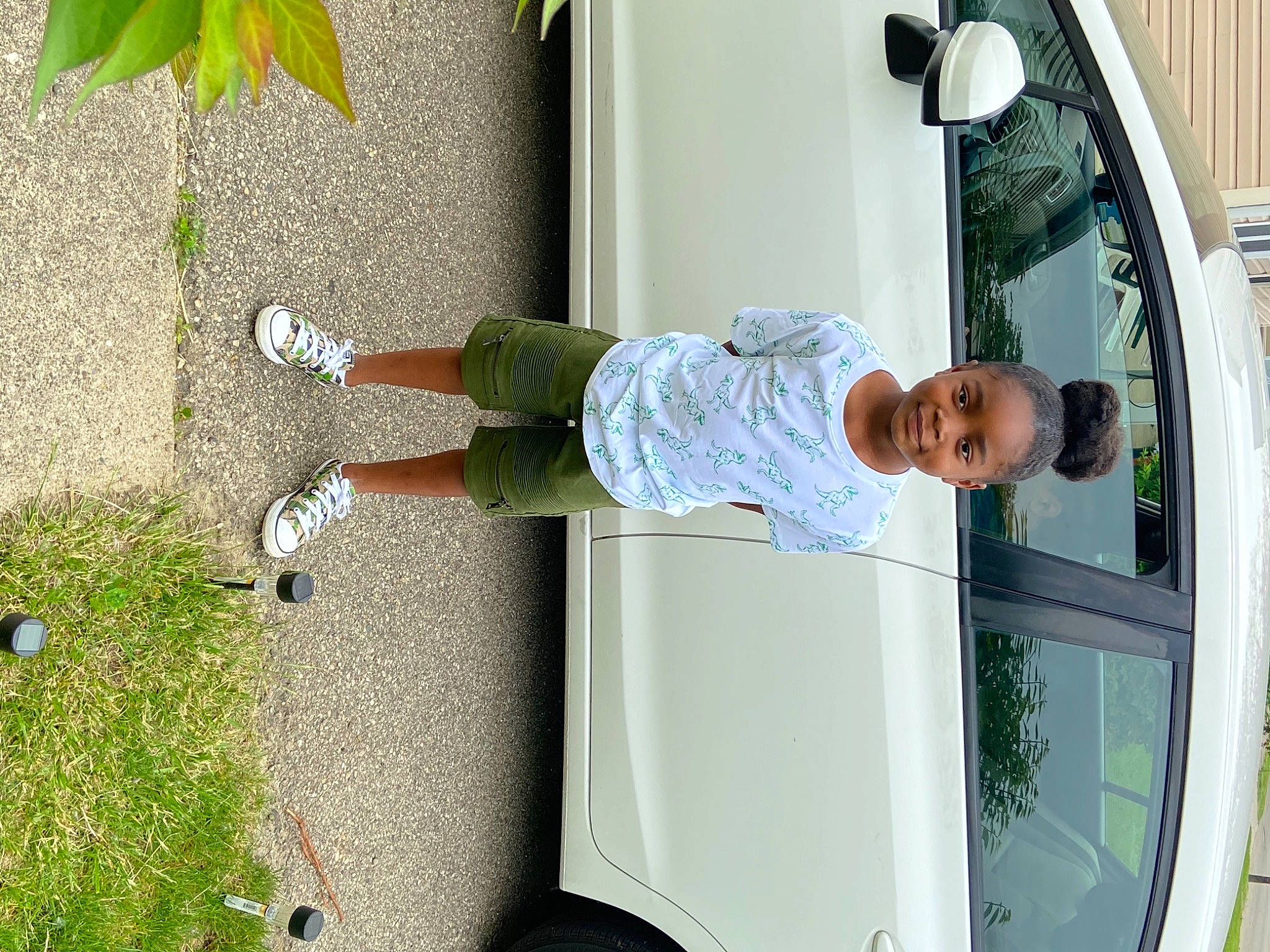 England joined the competition — help win amazing prizes! auto_part, automotive_design, automotive_exterior, automotive_lighting, automotive_window_part, car, door, door_handle, glass, grass, hood, joy, leisure, motor_vehicle, person, plant, sidewalk, t_shirt, tire, vehicle_door