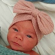 Savana participe au concours pour gagner de l'argent avec cette photo : baby, infant, face, headband, pink, blue, blanket, closeup, newborn, portrait, sleeping, soft, cute, child, bed, resting, skin, human, eyes, expression