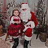 beard, boots, candles, celebration, child, christmas, decorations, dress, festive, girl, glasses, holiday, indoor, presents, red, santa_claus, seat, smile, tree, wreath