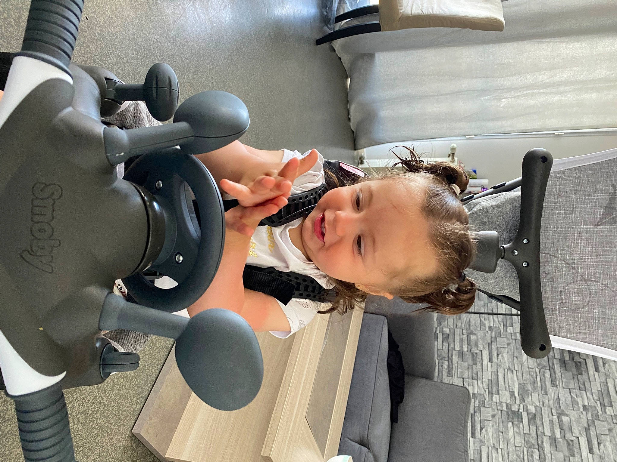 Sanaa participe au concours pour gagner de l'argent avec cette photo : audio_equipment, auto_part, automotive_design, baby, baby_products, child, comfort, eyewear, hearing, luxury_vehicle, machine, optical_instrument, person, personal_protective_equipment, product, service, sitting, smile, toddler