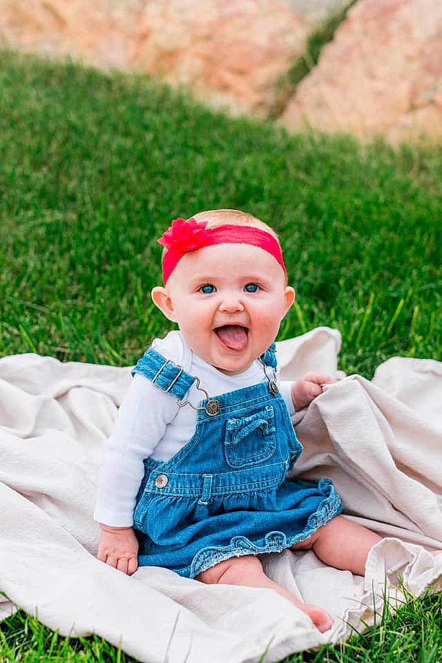 Adelaide joined the competition — help win amazing prizes! baby, baby_laughing, child, grass, happy, headwear, lawn, meadow, people_in_nature, person, plant, play, sitting, smile, toddler